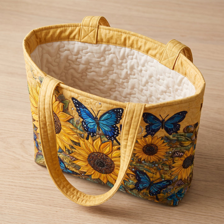 Bolso Artesanal — Girasoles y Mariposas Azules: abierto, mostrando el forro acolchado en crema liso