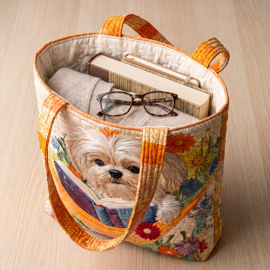 Bolso Artesanal — Shih Tzu con Libros y Flores: con un libro de tapa dura, un suéter doblado y lentes de lectura